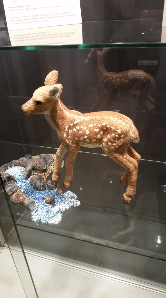 A fawn beadwork sculpture by Leslie B Grigsby